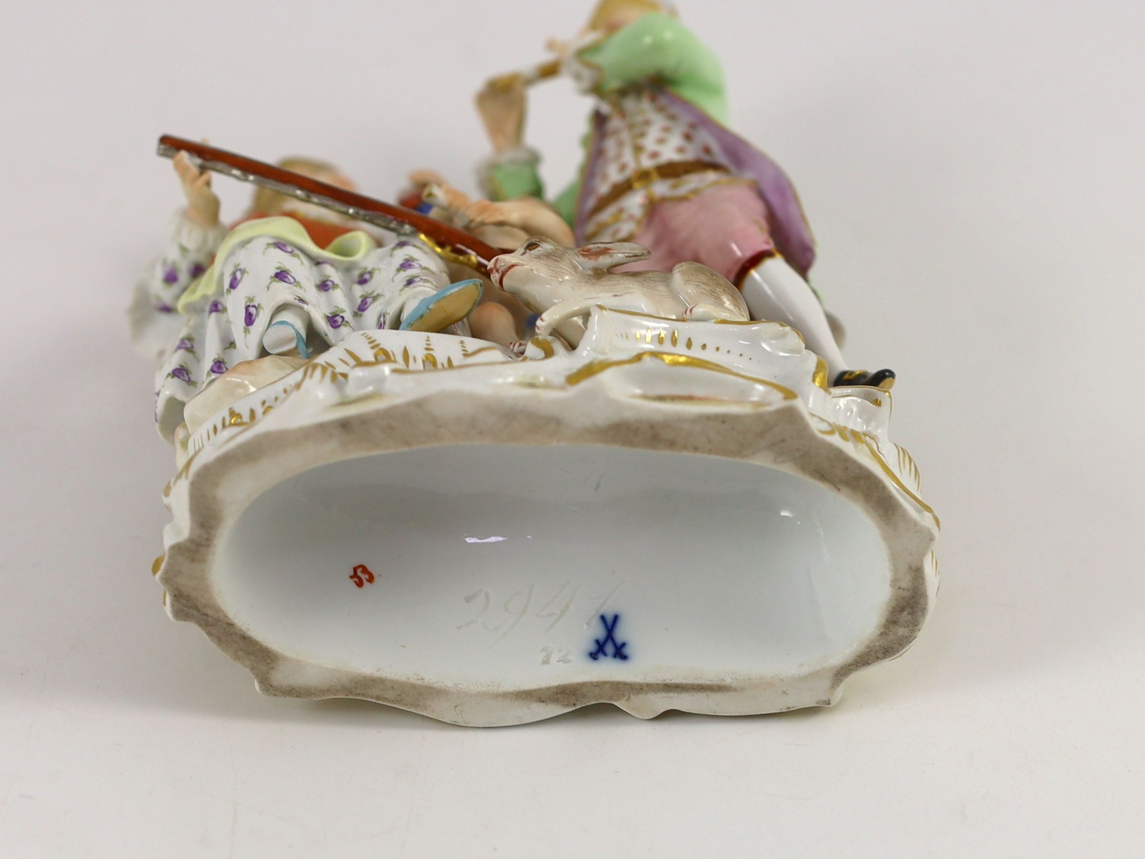 A Meissen Group of a young couple, Cupid and a hare, 19th century, 17 cm high